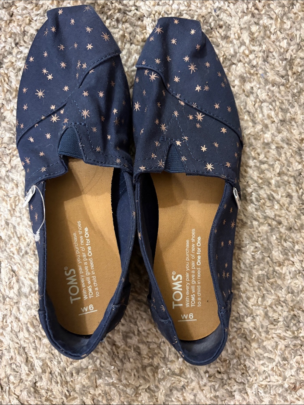 Toms Navy Canvas Slip-Ons with Gold Star Print